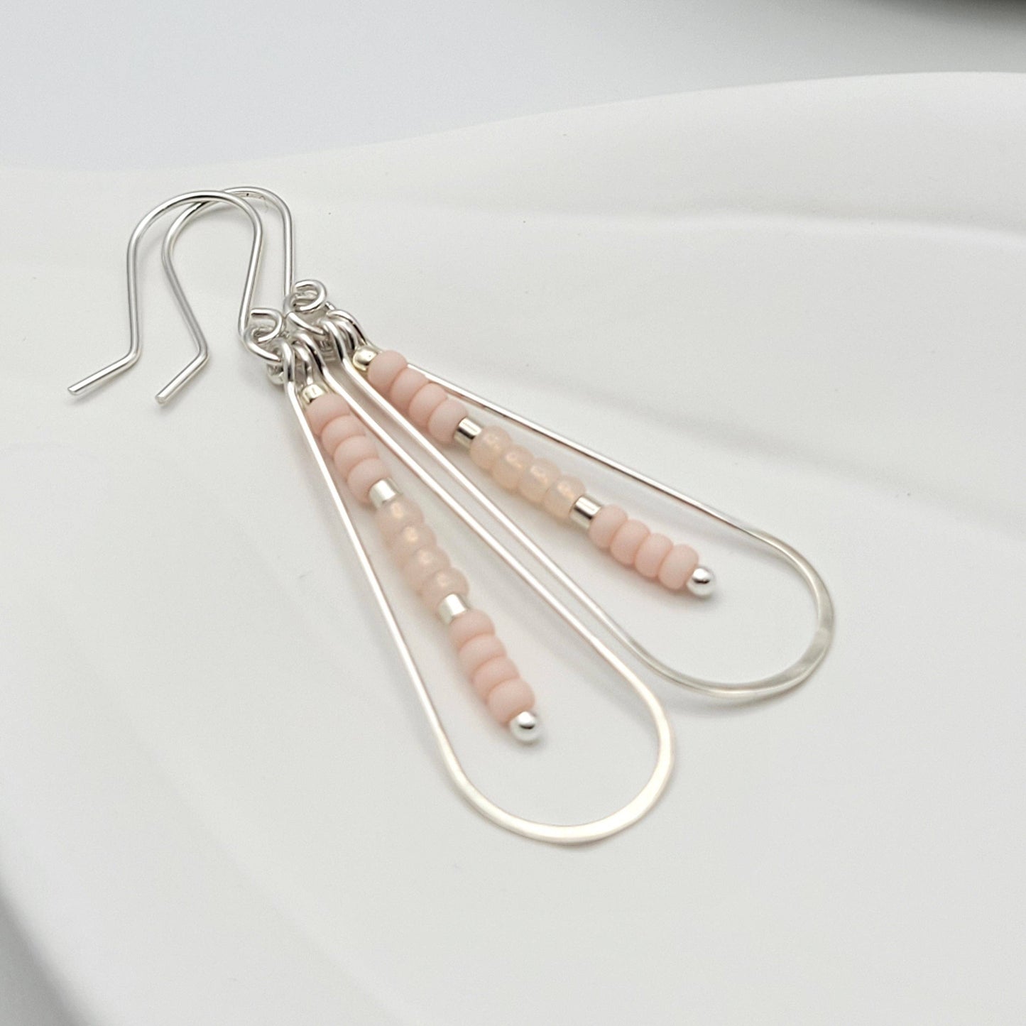 Long Silver Teardrop Hoop Earrings with Pink Seed Beads